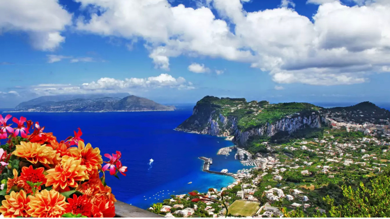 Pastel cliffside view of Positano along the Amalfi Coast